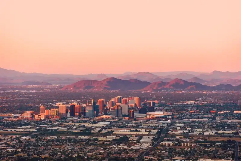 Phoenix Arizona downtown skyline with mountains electrical service area.